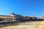 2 Trains passing the AMTRAK Station side by side